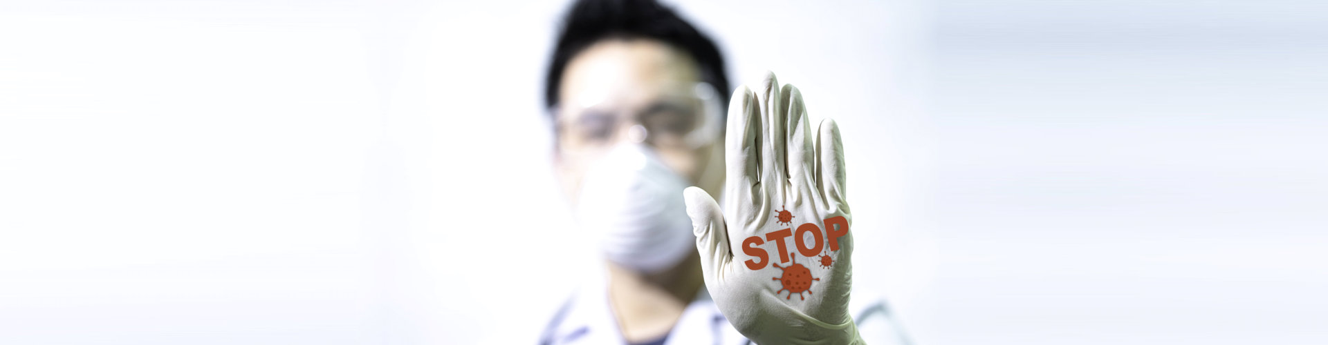 man showing stop sign